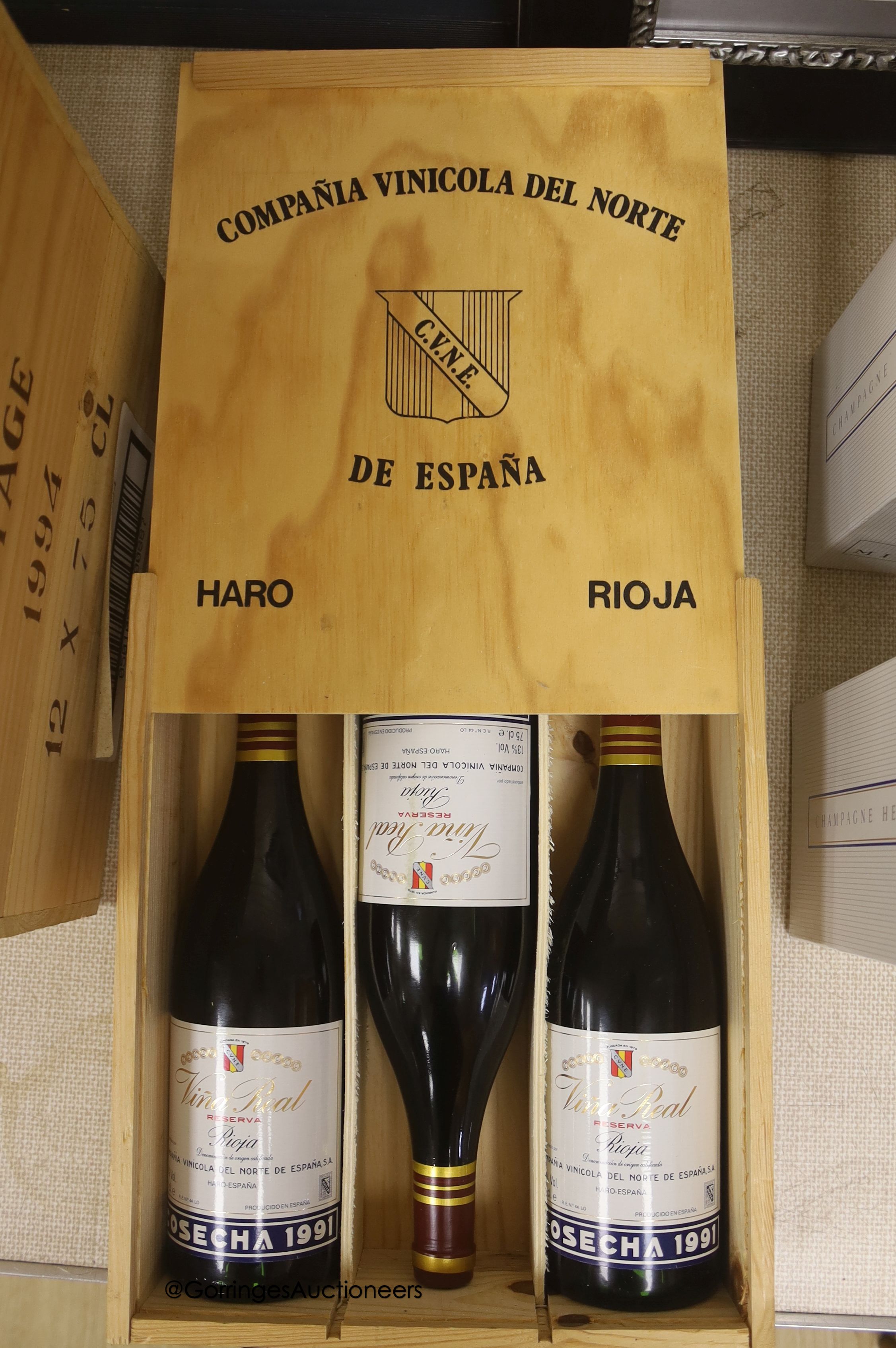 Three bottles of Vina Rela Rioja, 1991, in wood case